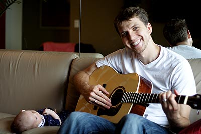 Playing the guitar for Ethan