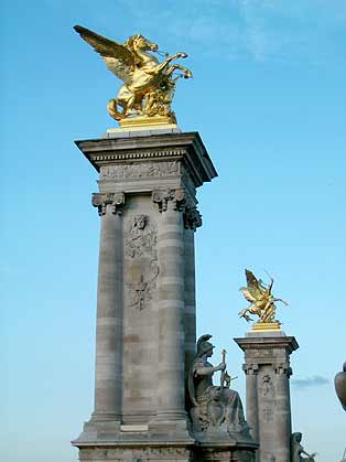 Pegasus-bedecked columns at the end of a bridge